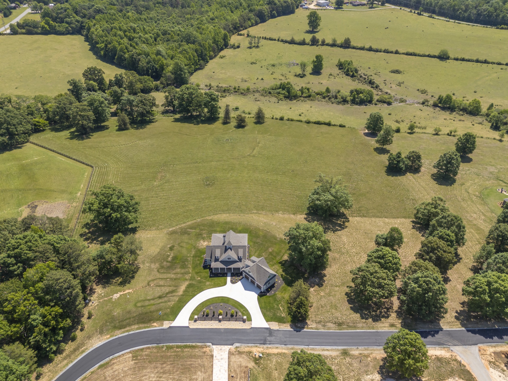 Horse farm on 10.10 acres with new home on trails!